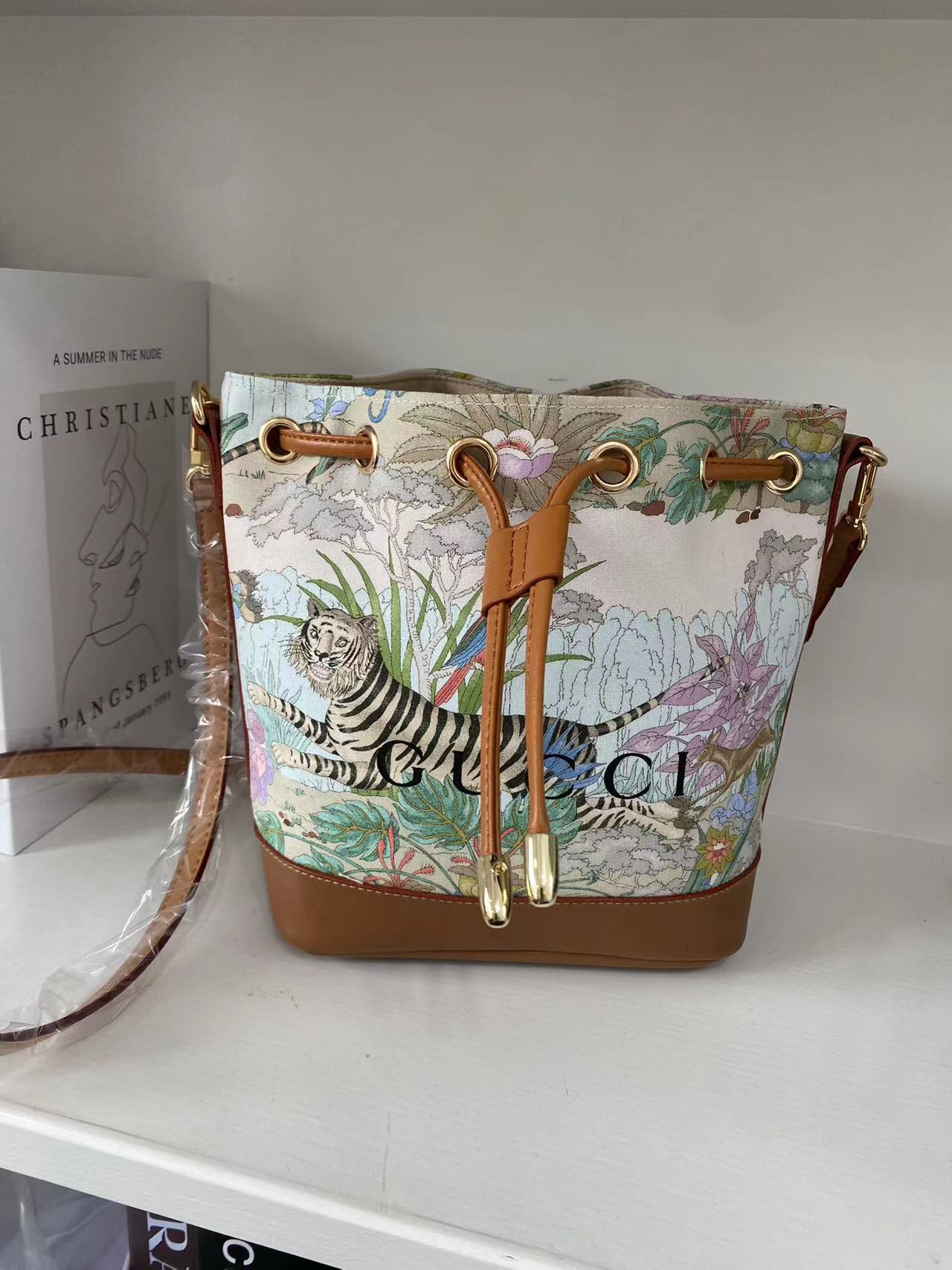 Introducing the Upcycled Gucci Dust Bag Bucket Bag