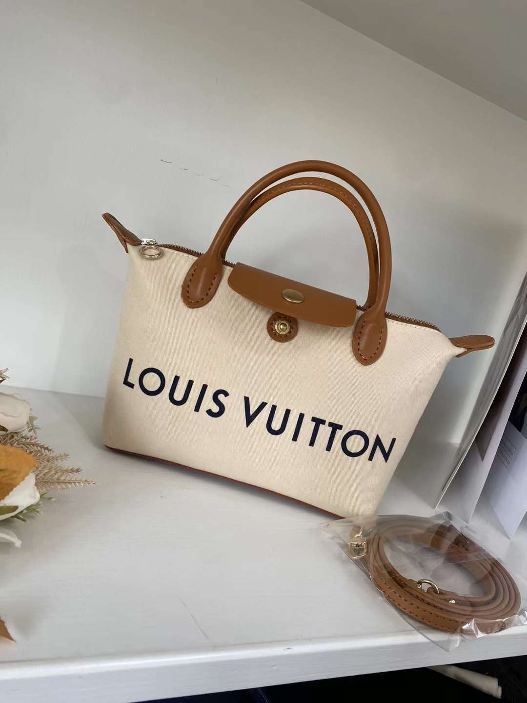 Introducing the Upcycled LV Dust Bag Dumpling-style Bag